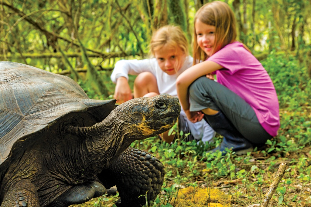 Children can get this close to a Galapagos Giant Tortoise, on Santa Cruz Island with Lindblad Expeditions. * Photo: Ralph Lee Hopkins